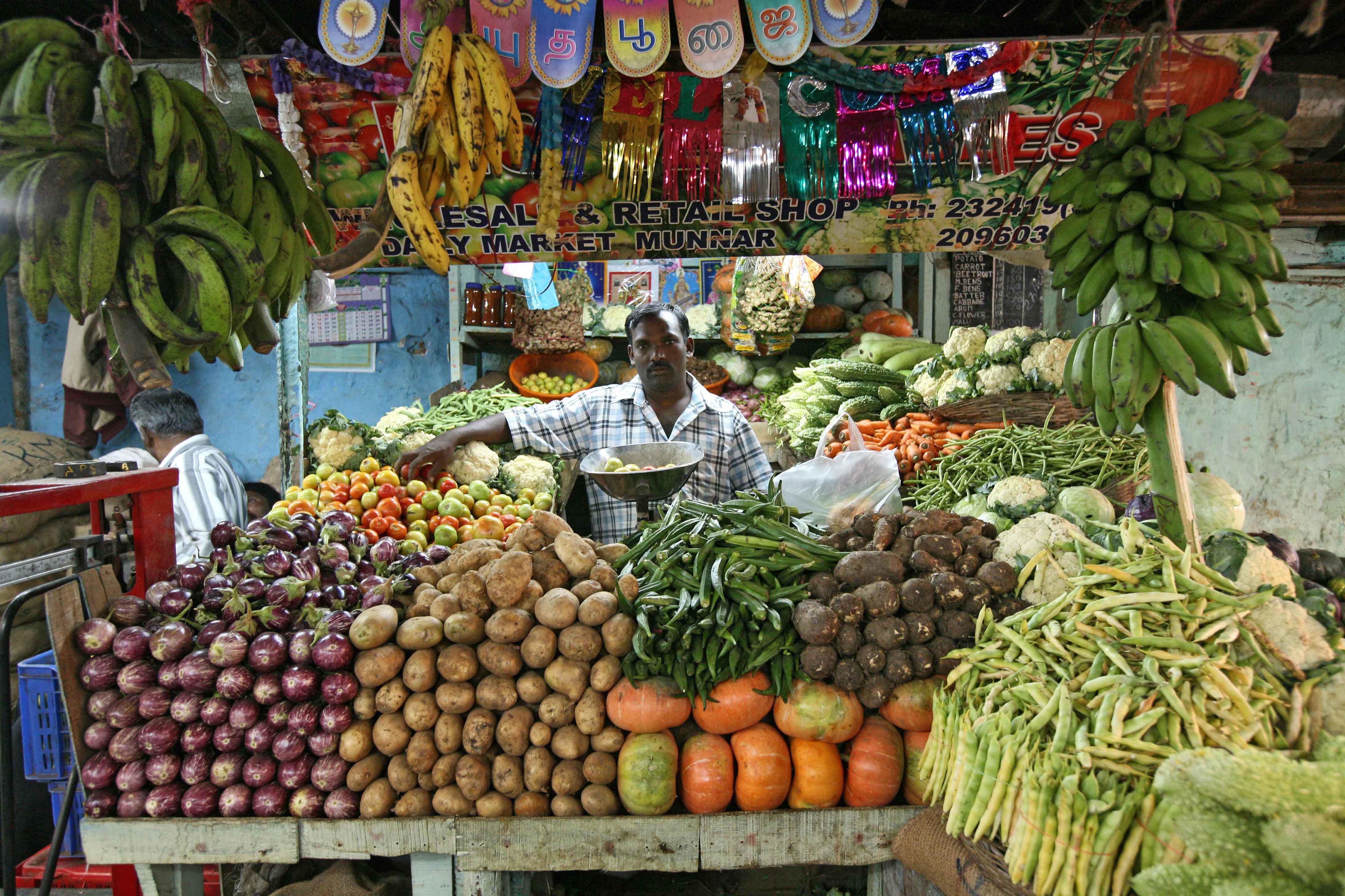 продавец овощей и фруктов в Керале